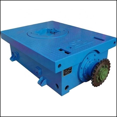7K Blue industrial drive gearbox housing with a large sprocket on the side used in heavy machinery